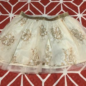 A white flower skirt with sparkles
